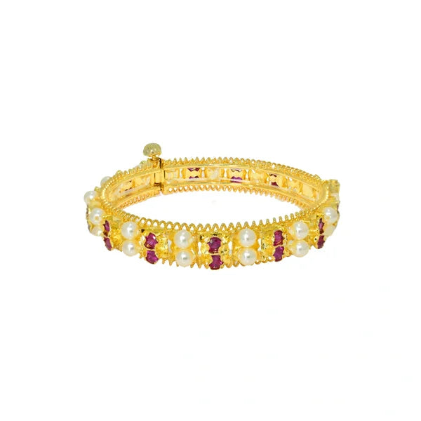 Elegant Pearl Bangle with Ruby Accents