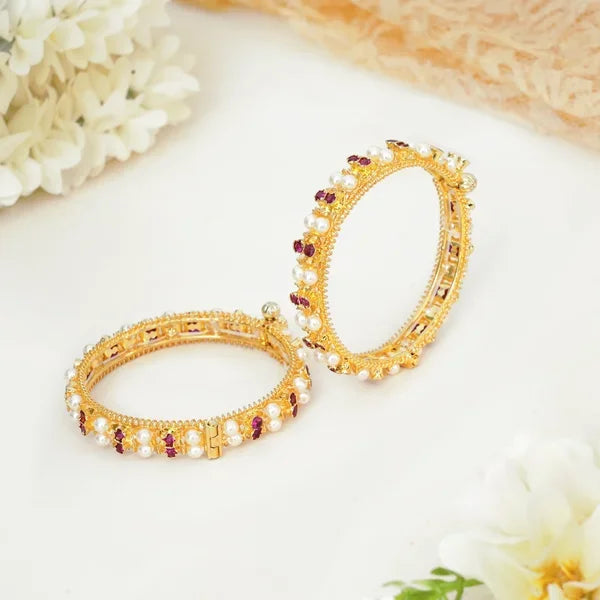 Elegant Pearl Bangle with Ruby Accents